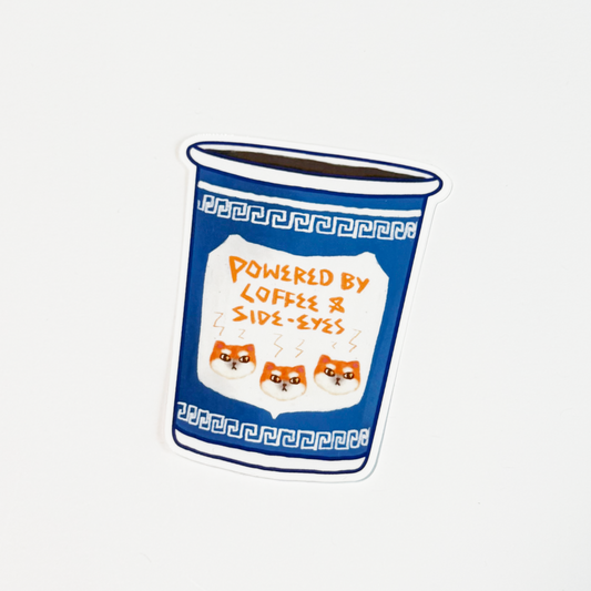 A die-cut sticker depicting a blue coffee cup with Greek key patterns and three orange cartoon dog faces, featuring the text 'POWERED BY COFFEE & SIDE-EYES' on a white background.