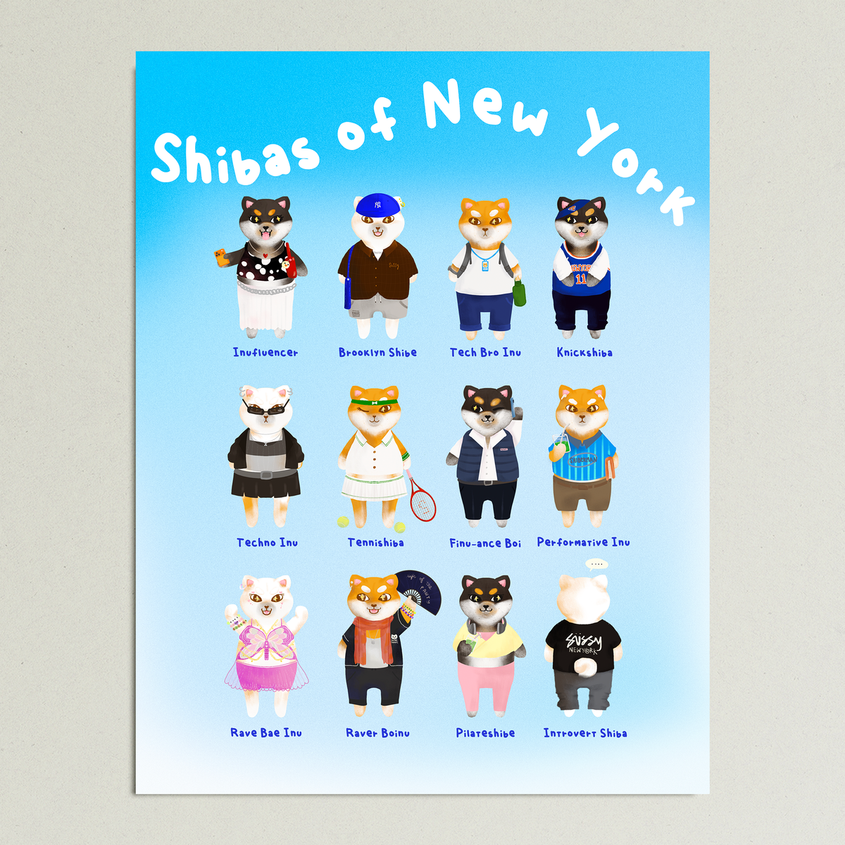 A printed poster featuring illustrated shiba inu characters in various street style and sports outfits, with the title 'Shibas of New York' at the top on a light blue background.