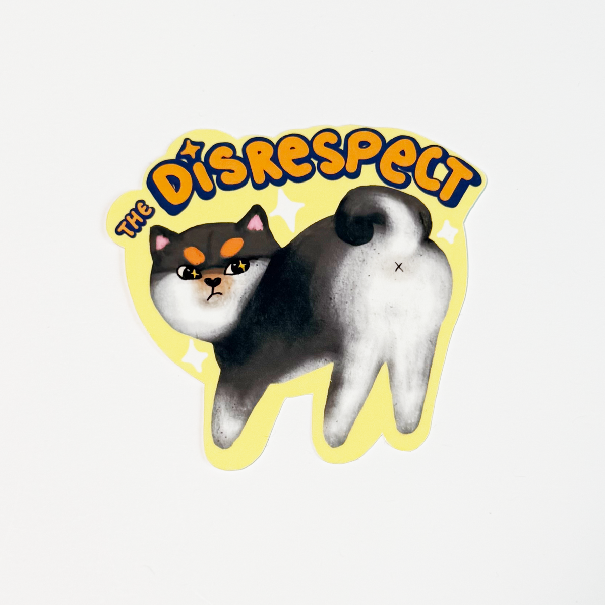 Black Shiba sticking his butt out with the word the disrespect on top of him. It is a sticker in vibrant black orange and yellow color